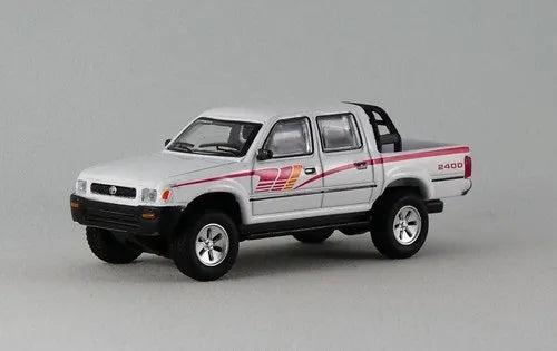 Jackie M Toyota Hillux White, Red Includes three barrels