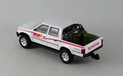Jackie M Toyota Hillux White, Red Includes three barrels