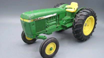 ERTL   John Deere 584 Tractor  Green