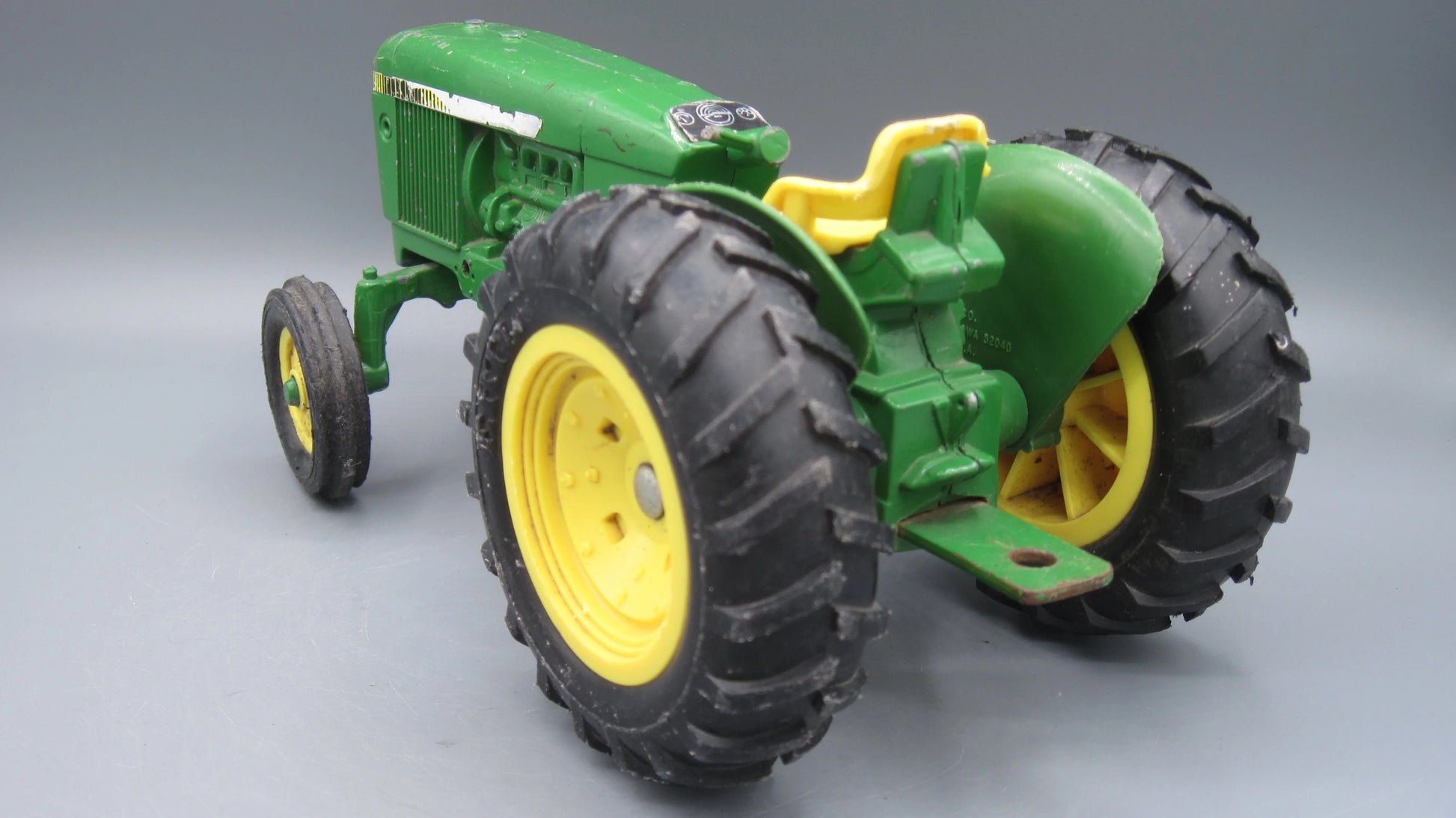 ERTL   John Deere 584 Tractor  Green