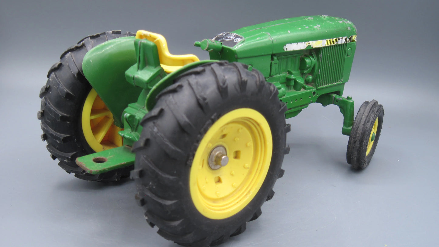 ERTL   John Deere 584 Tractor  Green