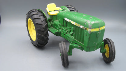 ERTL   John Deere 584 Tractor  Green
