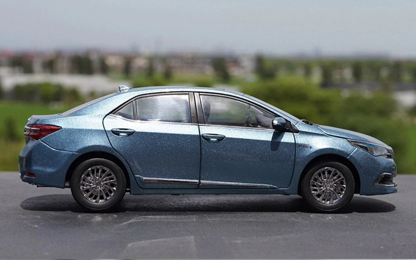 Toyota Corp.   Toyota Corolla Hybrid (Pakistani Grande)  Blue