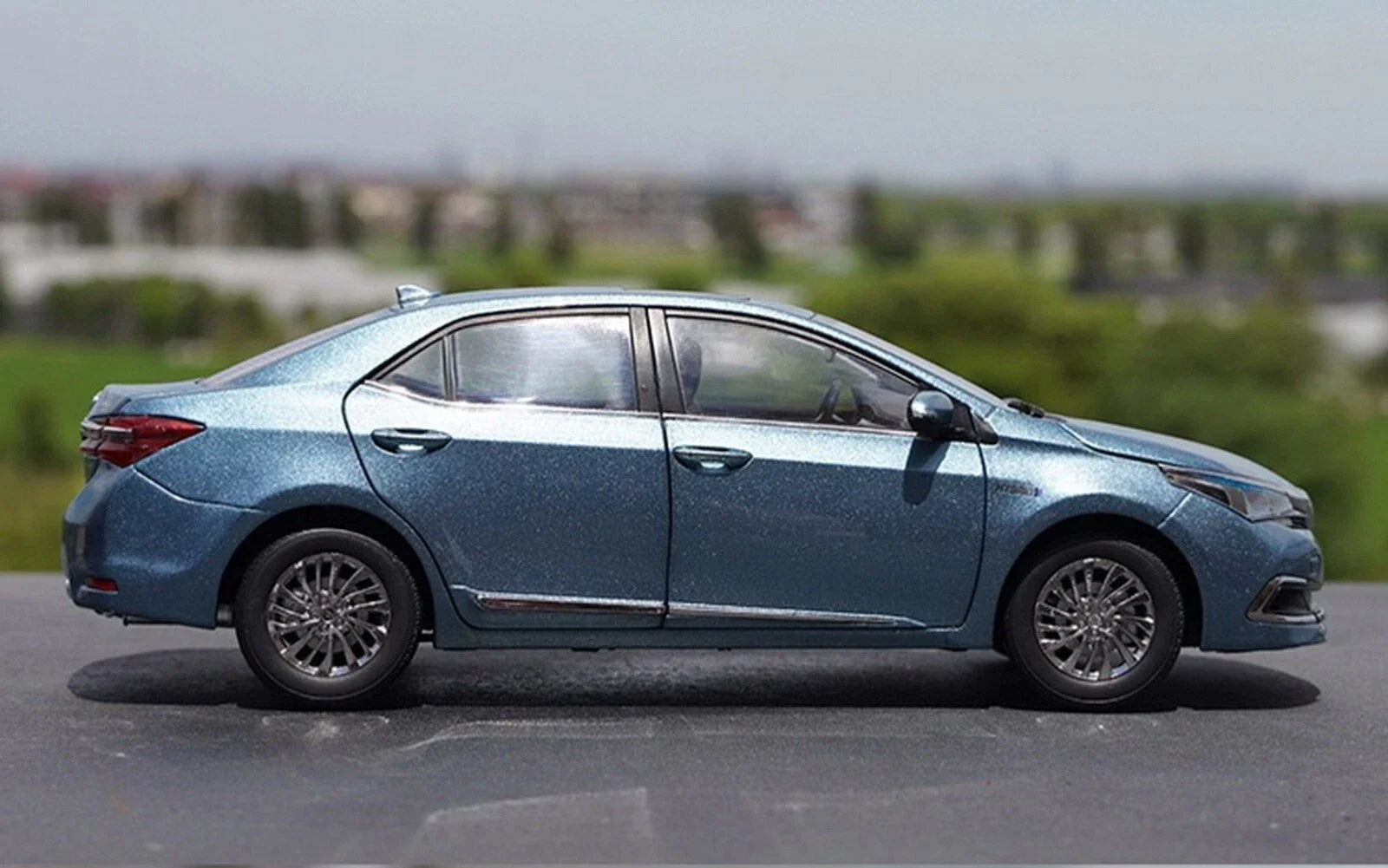Toyota Corp.   Toyota Corolla Hybrid (Pakistani Grande)  Blue