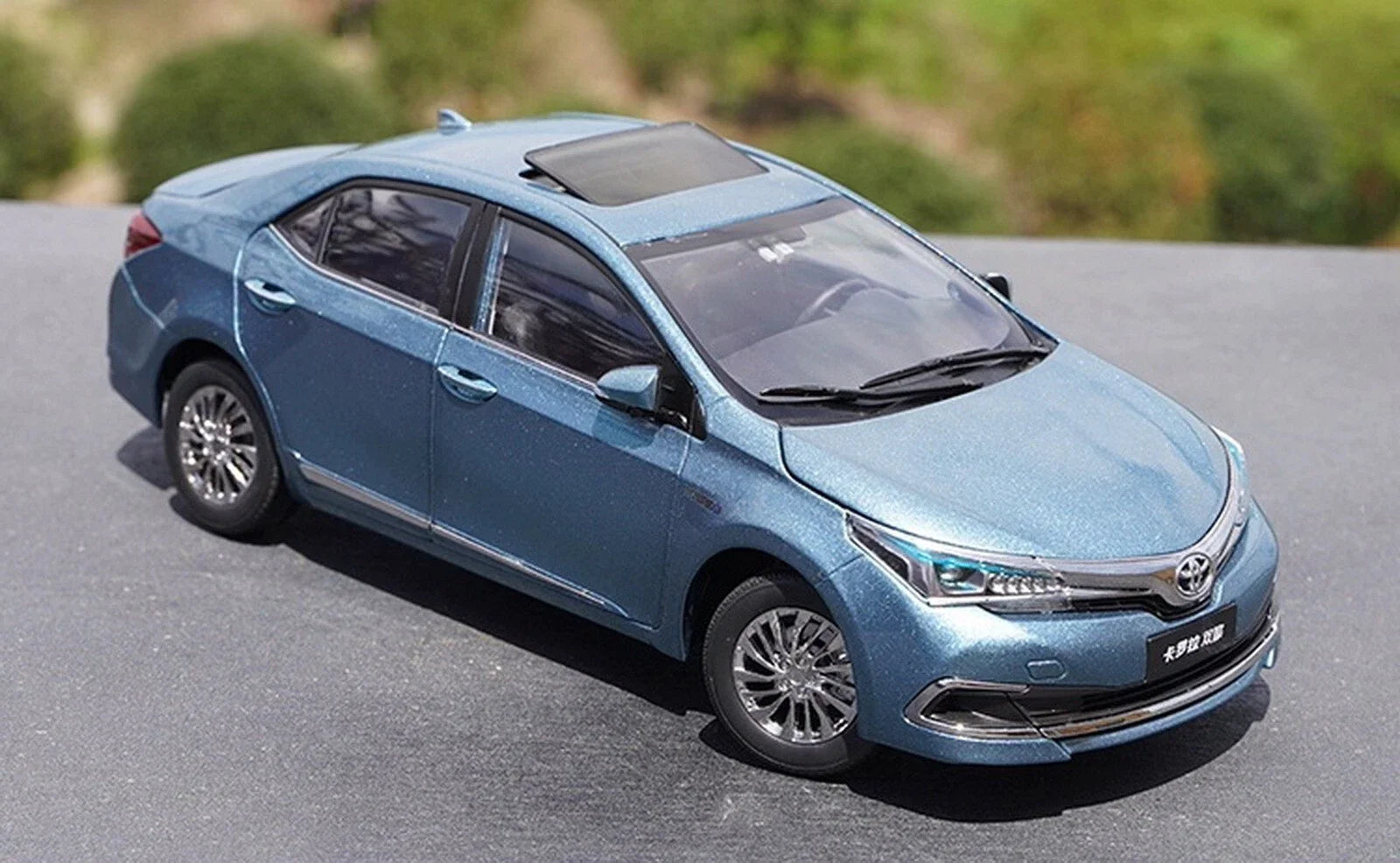 Toyota Corp.   Toyota Corolla Hybrid (Pakistani Grande)  Blue