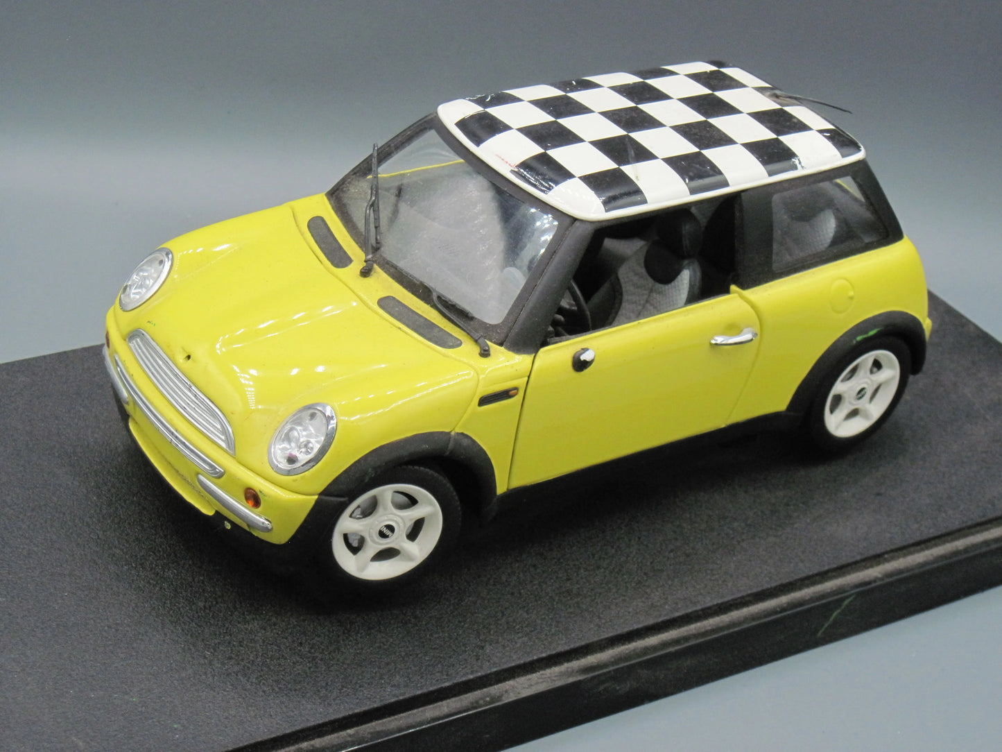 Hot Wheels   Mini Cooper with Base  Yellow