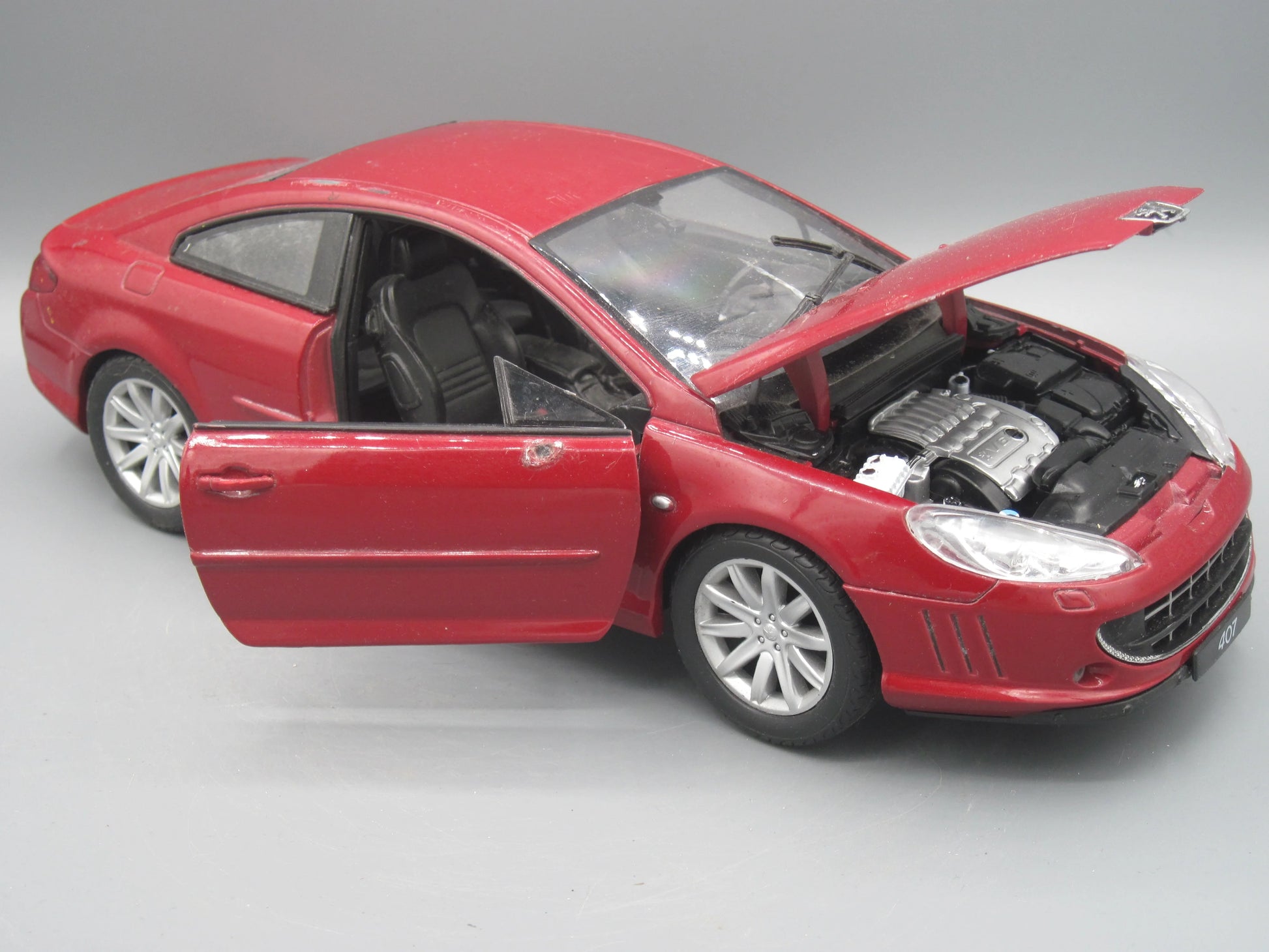 Welly   Peugeot Coupe 407  Maroon