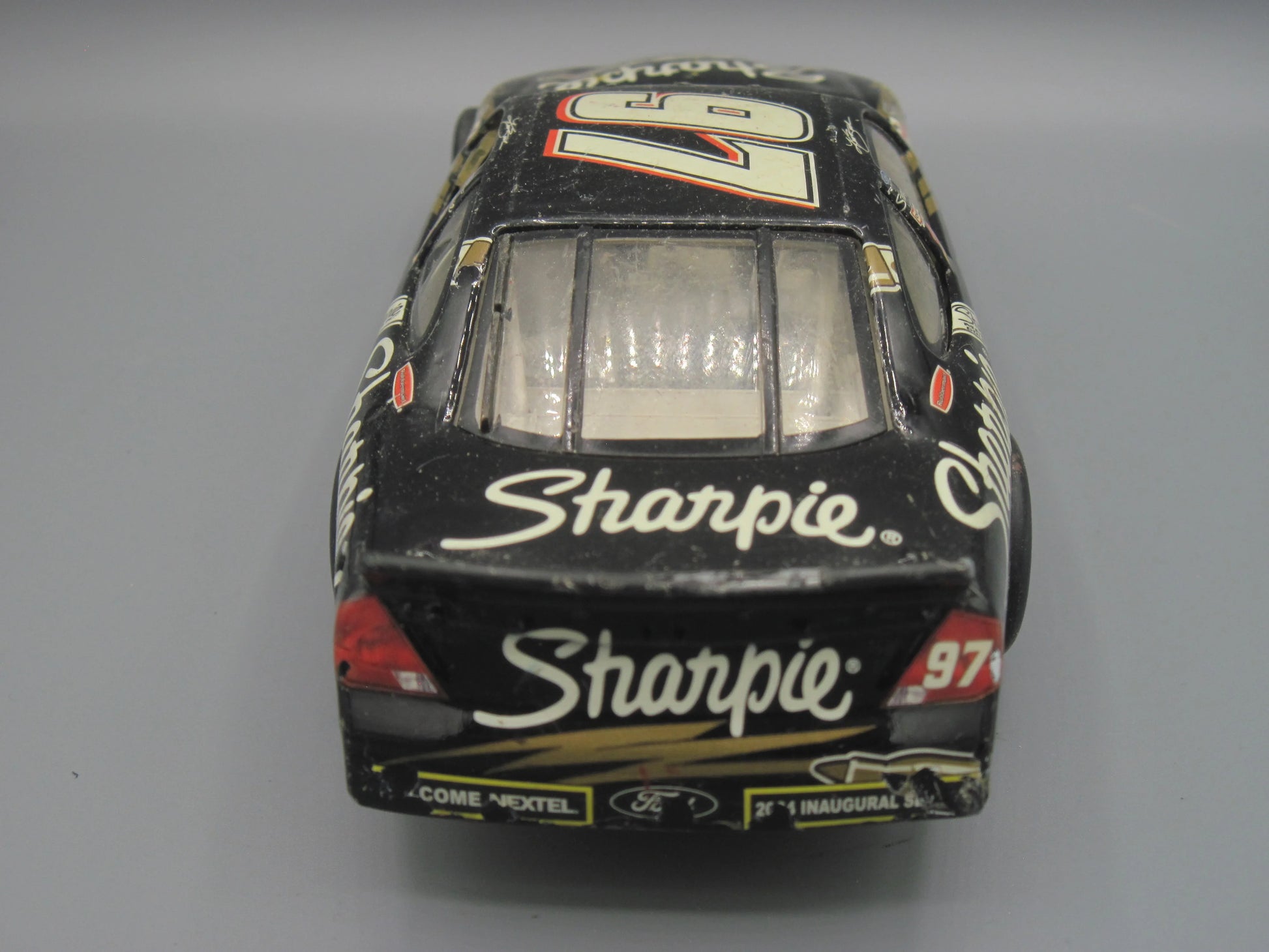 Hot Wheels   Ford Taurus (NASCAR) 2003 Black & Gold Sharpie #97