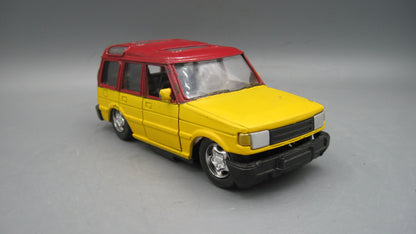 New Ray   Land Rover Discovery 1  Maroon & Yellow
