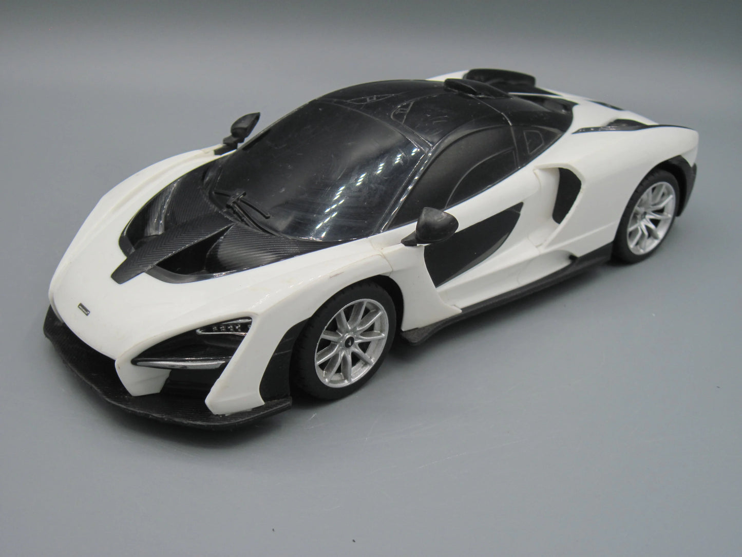Rastar   Mclaren Senna with RC  Black & White