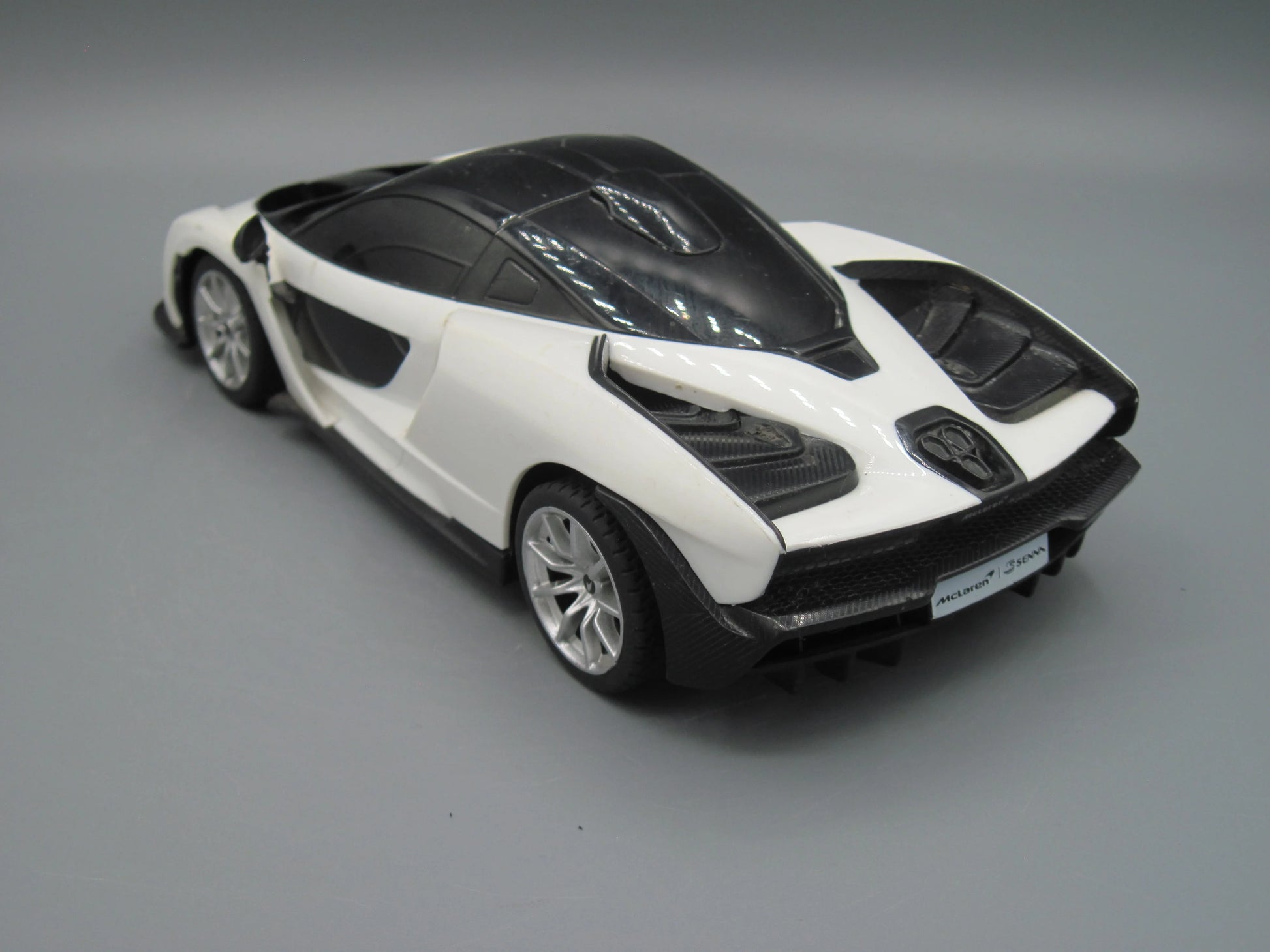 Rastar   Mclaren Senna with RC  Black & White