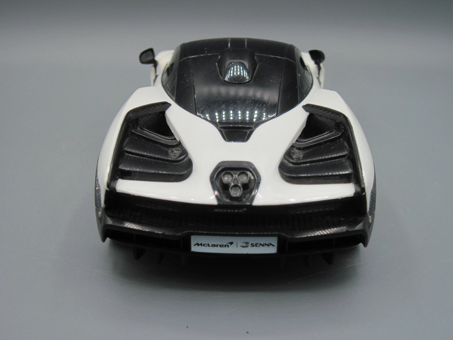 Rastar   Mclaren Senna with RC  Black & White