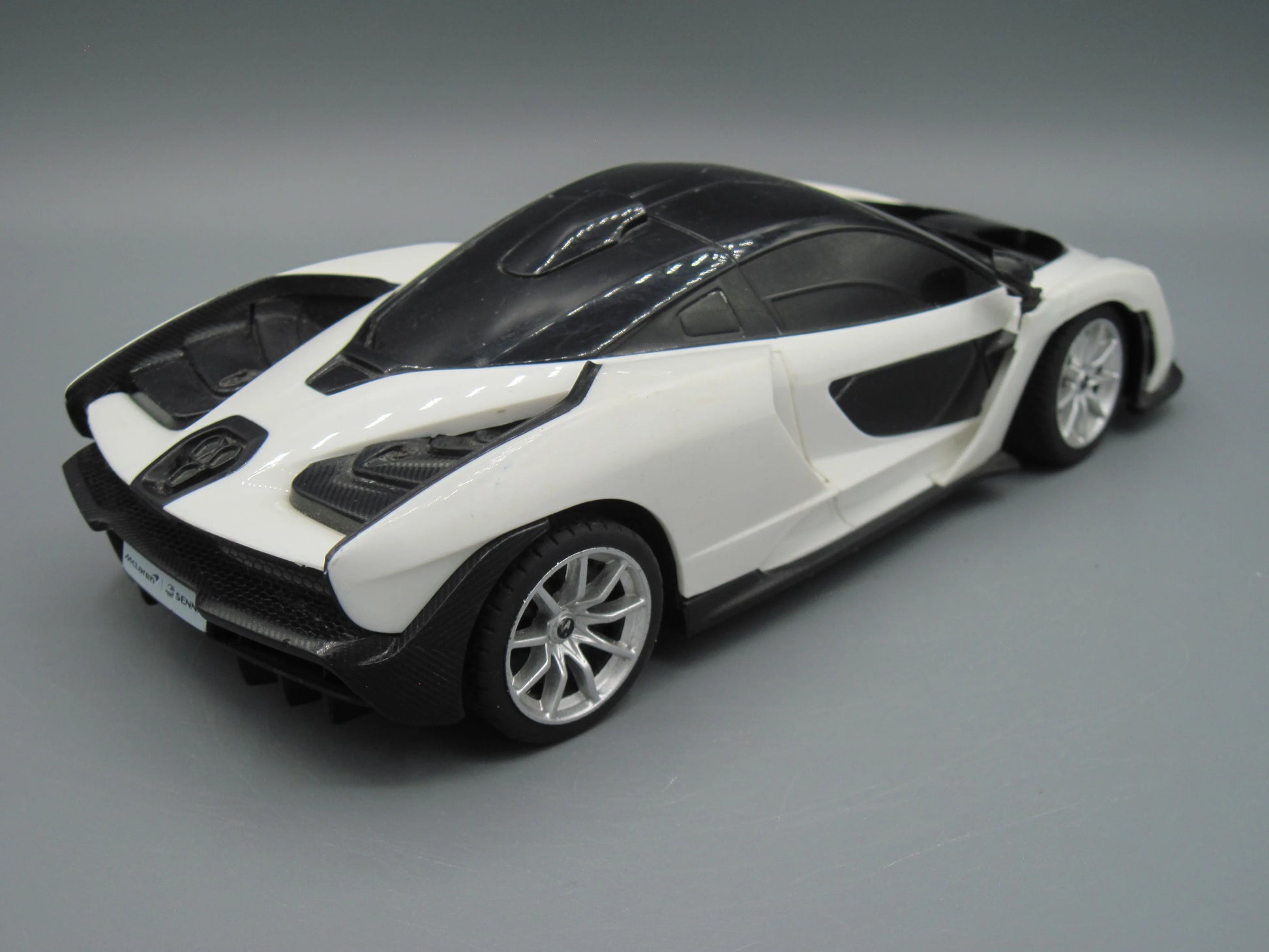 Rastar   Mclaren Senna with RC  Black & White