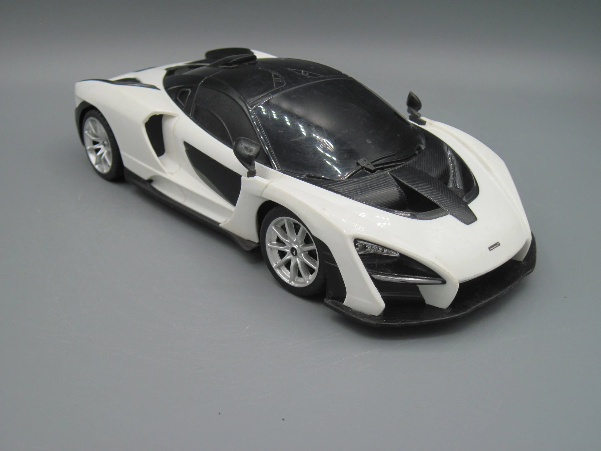Rastar   Mclaren Senna with RC  Black & White