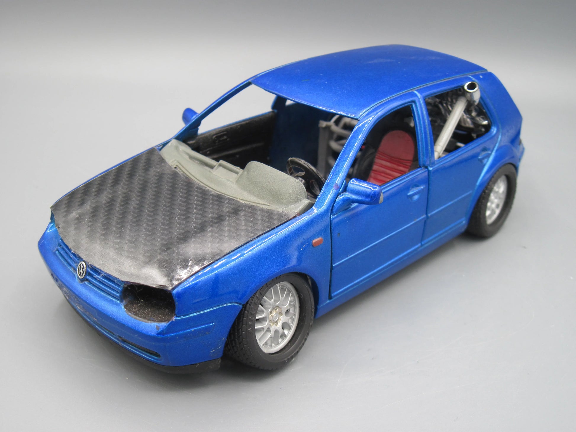 Welly   Volkswagen Golf IV  Blue