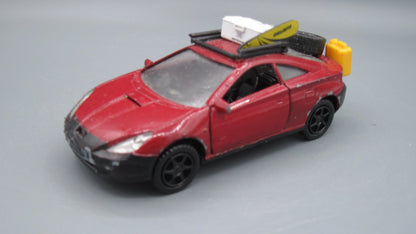 Kinsmart   Toyota  Celica  Red Surfing boar and box on top