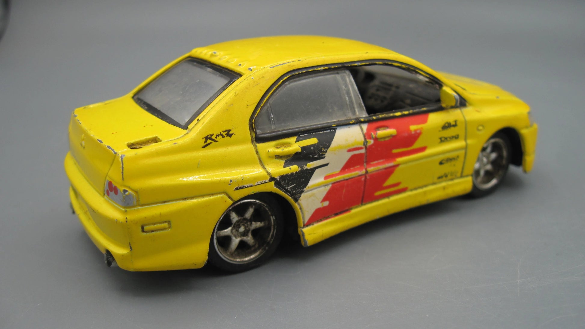 Unbranded   Mitsubishi Lancer Evolution IX  Yellow