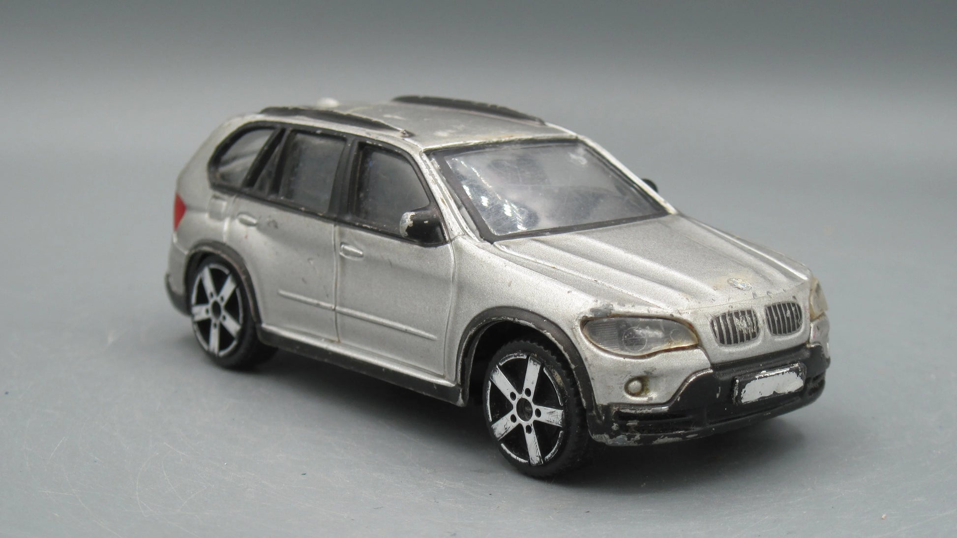 Bburago   BMW X5  Black&Tan gold