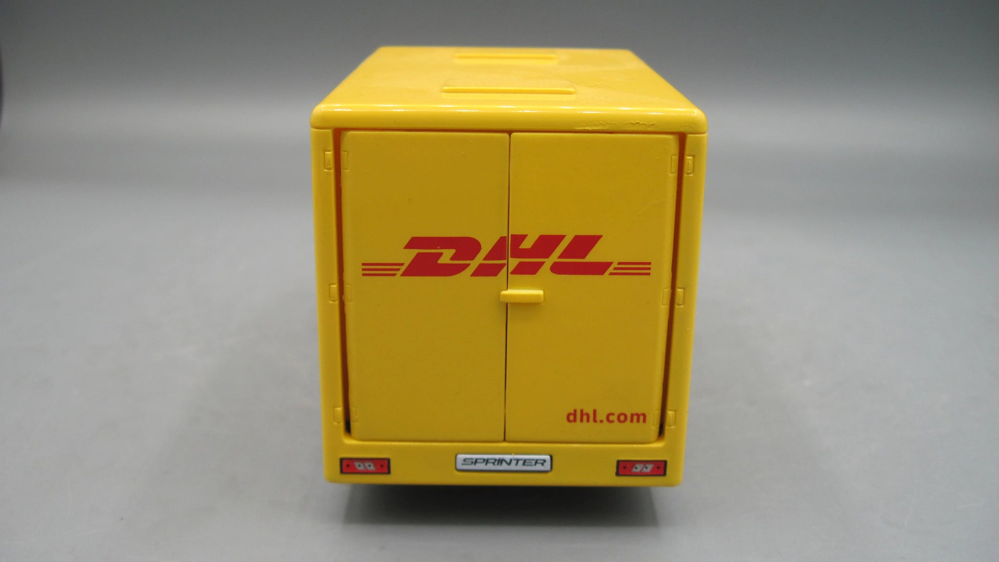 Kinsmart   Mercedes Benz DHL - Sprinter  Yellow DHL Delivery Van