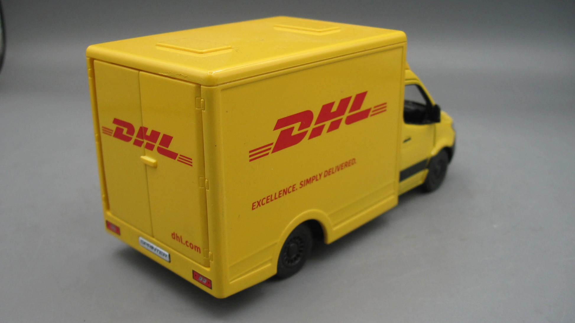 Kinsmart   Mercedes Benz DHL - Sprinter  Yellow DHL Delivery Van