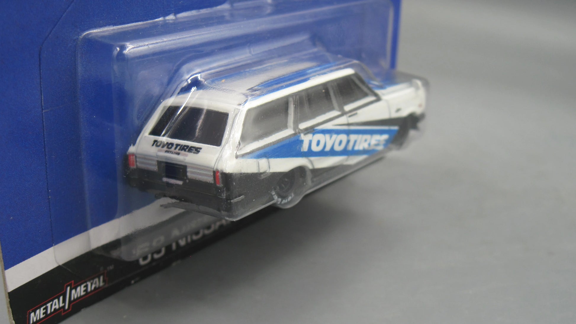 Hotwheels  Premium Nissan Skyline Van  White, Blue Toyo Tires