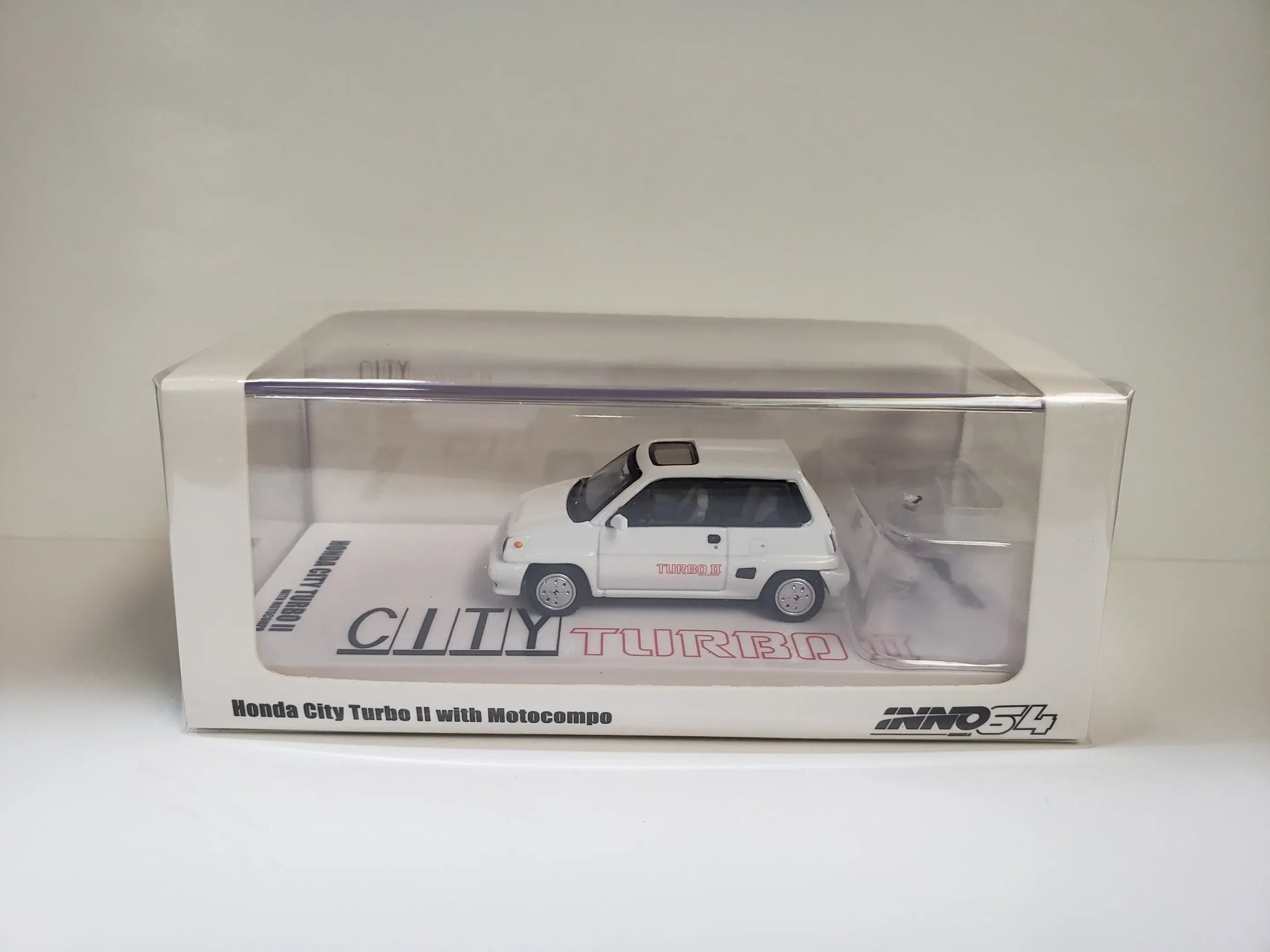 Inno 64   Honda City Turbo II   White With Motocompo bike