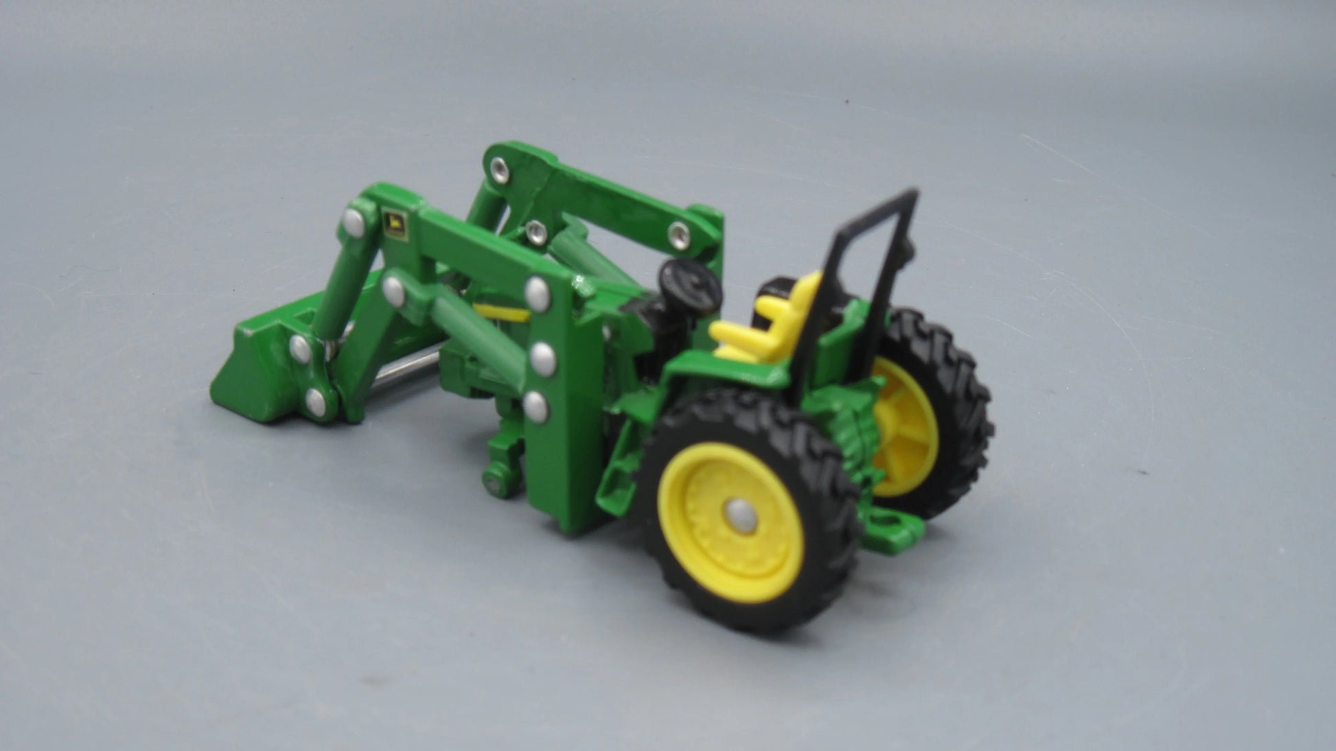 ERTL   John Deere 6410 Open Station Tractor With Front Loader  Green